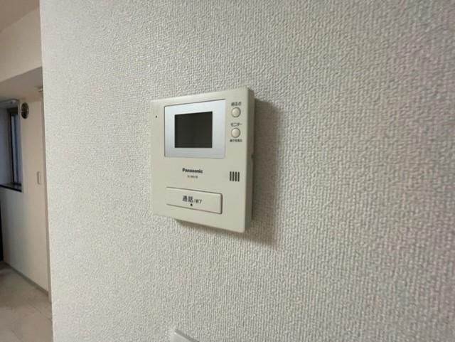 y̑ݔz@