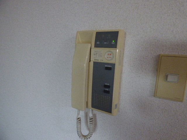 y̑ݔz@